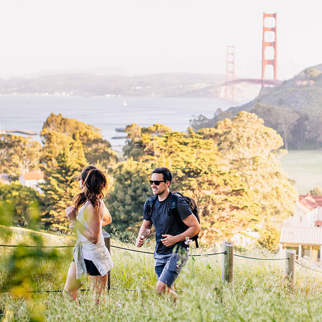 Couple hiking at Cavallo Point Lodge in Sausalito, California